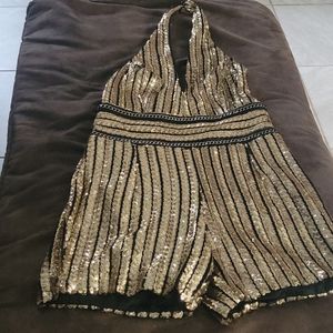 Sequence halter top short rumper.